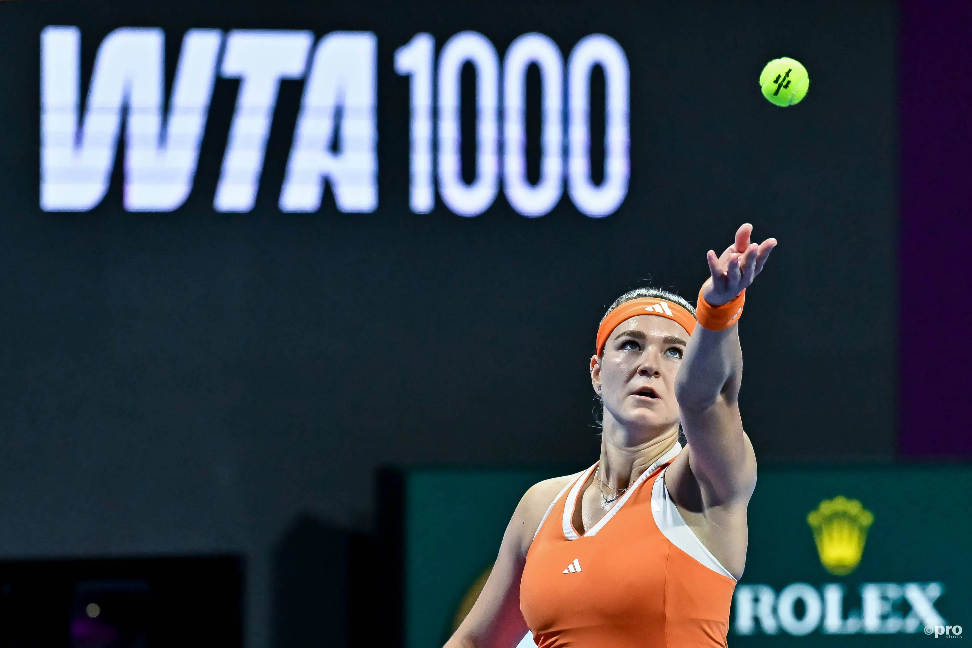 Karolina Muchova serves.