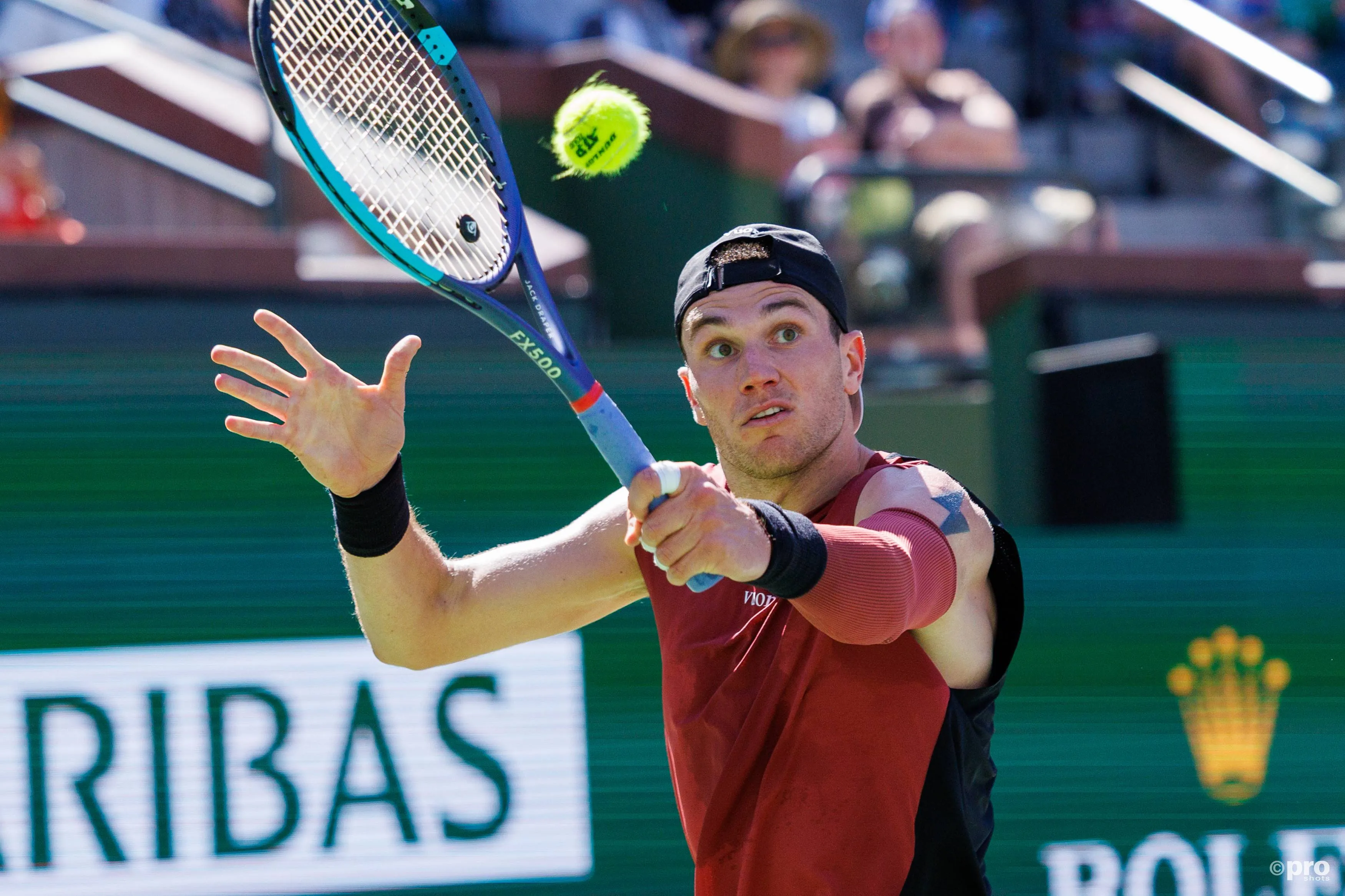 Jack Draper swats back the forehand.