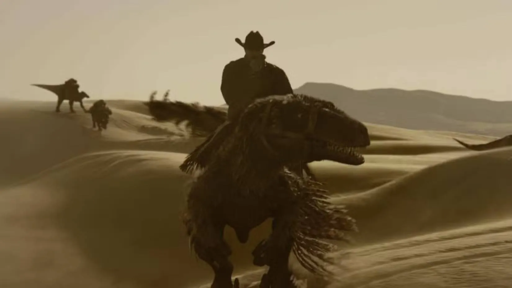 cowboy-riding-a-raptor-in-dinosaurs-of-the-wild-west-teaser