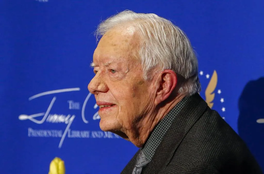 Jimmy Carter bidt voor Donald Trump
