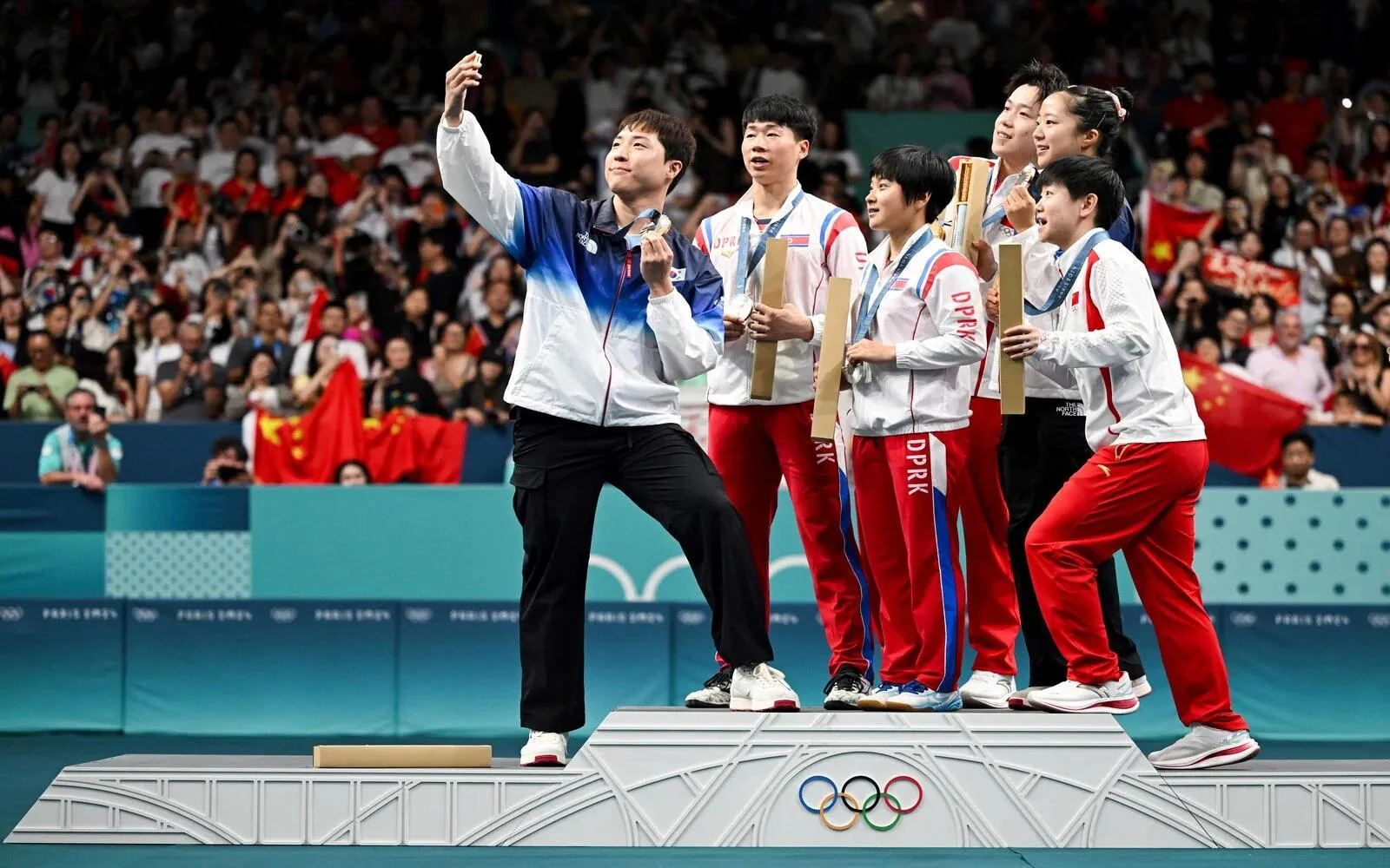 Iconische 'Victory Selfie' brengt Koreaanse sporters (en landen) samen