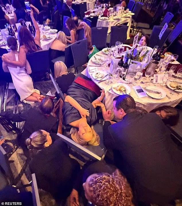 108171757-15767475-Several_gunshots_rang_out_as_panicked_attendees_immediately_duck-a-3_1777245542508