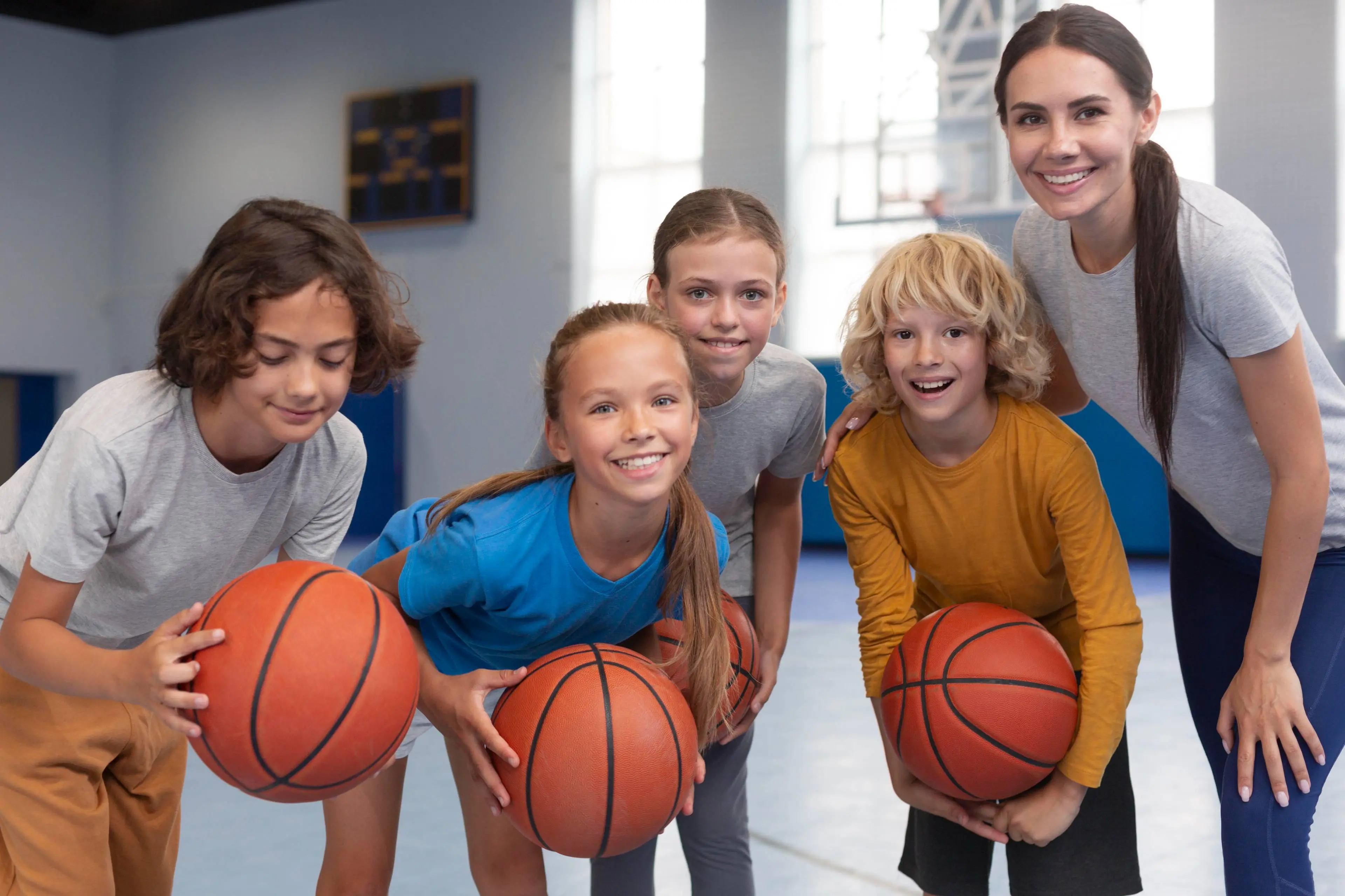 sports-teacher-with-her-students