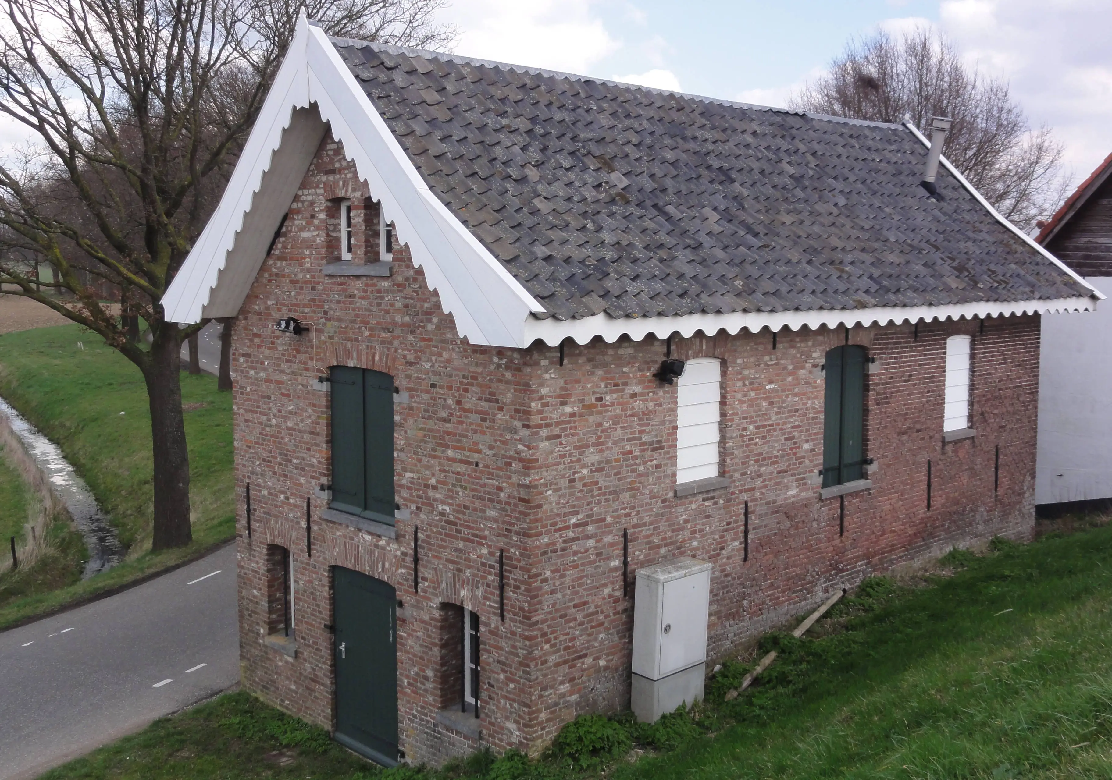 Wijchen_Ravensteinseweg_521_dijkmagazijn_(poldermagazijn)_Gem.Mon._(02)
