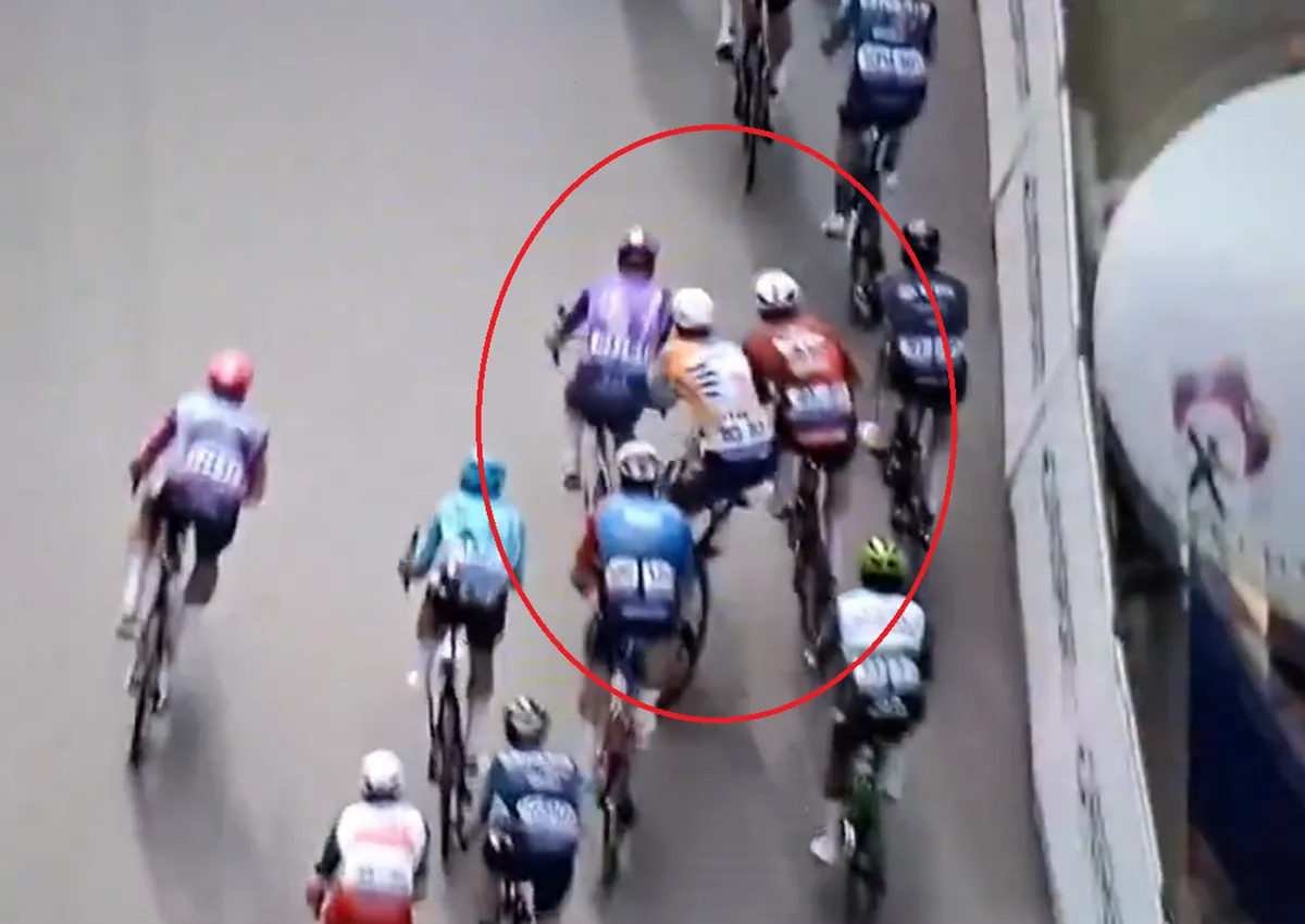 🎥 Lewis Askey continues after lead-out for Girmay — and pays the price after a shove from De Lie