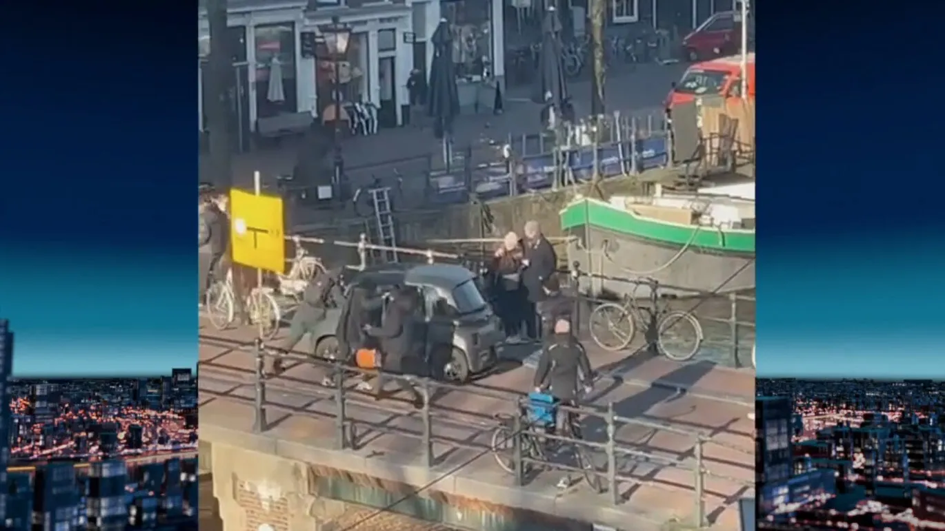 nieuwe beelden van dollemansrit in amsterdam bestuurder duwde fietser op de grond video