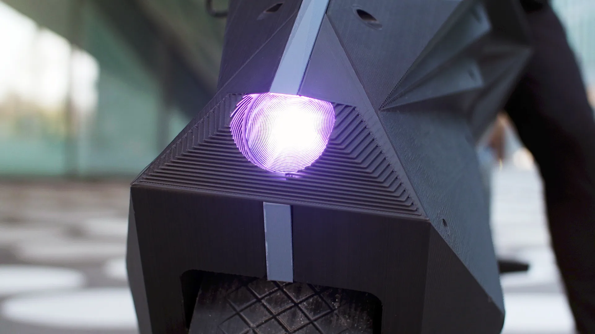 nera e motorcycle has embedded led lights and 3d printed reflectors