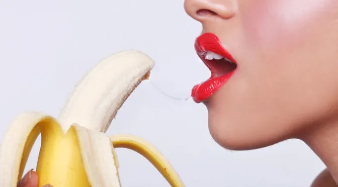 sensual woman sucking banana 672x372