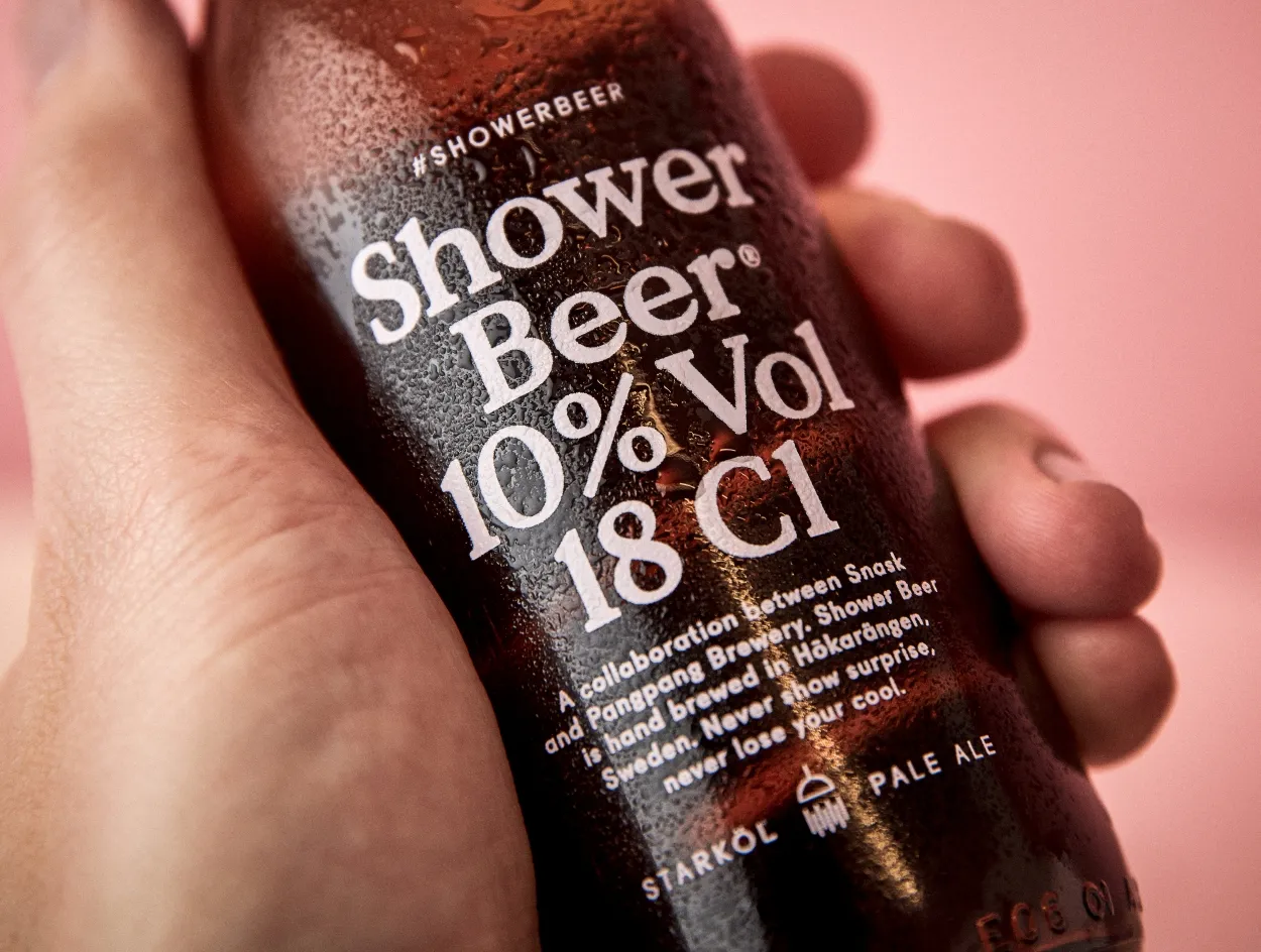 shower beer 06 hand close up2 1250x944
