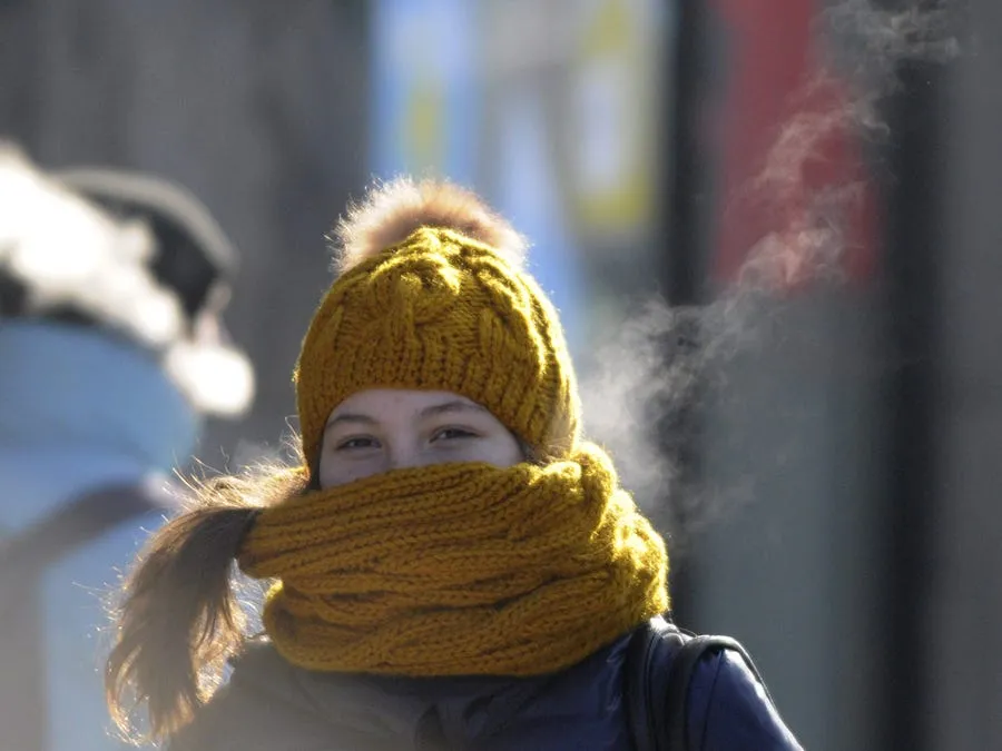 a girl covers her face in kiev ukraine