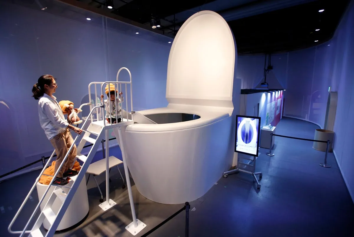 a girl wearing a feces shaped hat prepares to slide down into a 16 foot toilet at an exhibition titled toilet human waste and earths future at the miraikan national museum of emerging science and innovation in tokyo on july 3