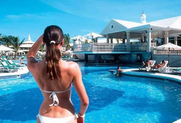 fantasy riu negril clubs pool is filled with beautiful people