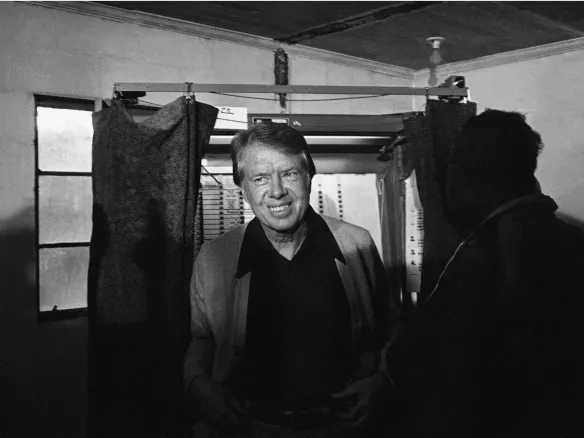 jimmy carter emerges from a georgia voting booth on election day in november 1976 584x438