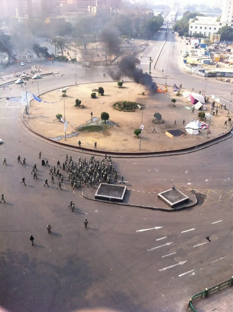 sharifkouddous groups of soldiers roaming square some people getting beaten randomly tents burning tahrir looks like a war zone