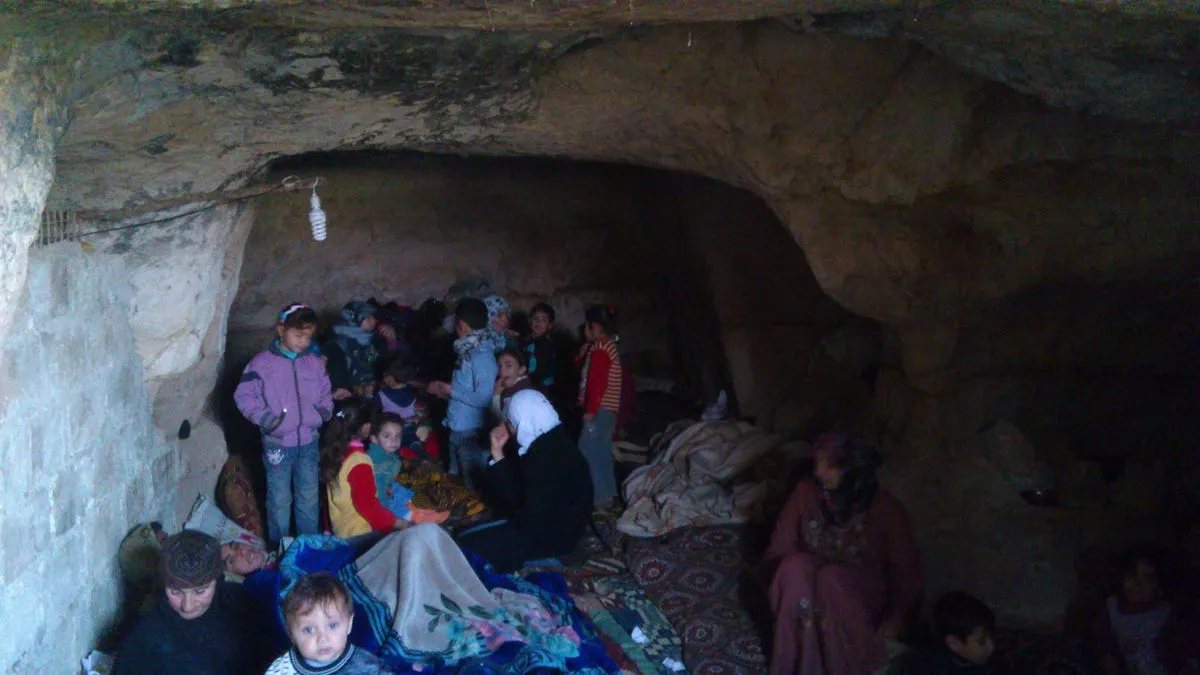 the civil war has been raging in syria for almost five years this photo taken in 2012 shows finding refuge in a cave near hamah