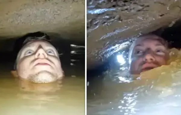 Huiveringwekkende beelden: mannen onderzoeken verlaten grot en verdrinken bijna nadat ze luchtzak missen