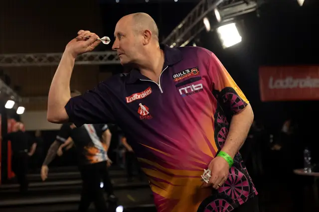 Wilson secures immediate return to PDC Tour on Day One of UK Q-School Final Stage