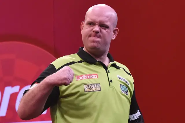 Van Gerwen gives Nathan Care one of his nine-dart pins after perfect leg on JDC Tour