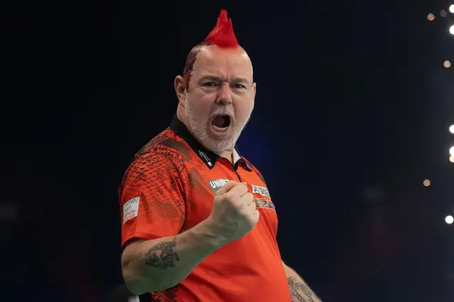 VIDEO: Wright discusses practice routine in man cave: "I still pick the darts up everyday but I'd only throw like nine or twelve darts"