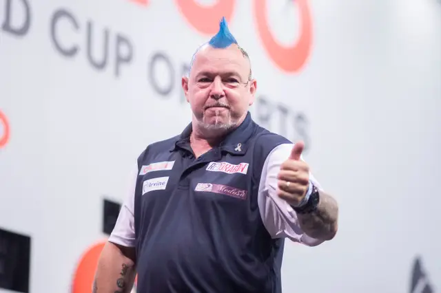 Scotland through to World Cup of Darts Quarter-Finals after hard fought singles victories over Poland
