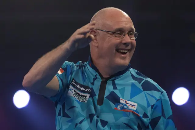 White claims first win at World Darts Championship in four years, sets up tie with Anderson