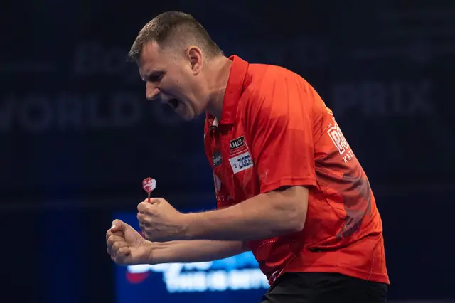 Ratajski reaches Quarter-Finals at World Grand Prix for first time with victory over Cross