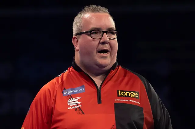 Bunting sets up semi-final showdown with Price after edgy win over Searle