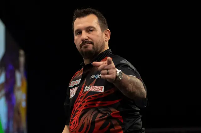 Clayton only drops two legs in second round at Grand Slam and faces Price in quarter-final clash