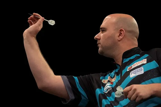 Cross first quarter-finalist at Grand Slam of Darts after easy win