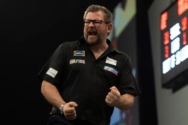 Wade first into Grand Slam of Darts semi-finals with superb win over Cross