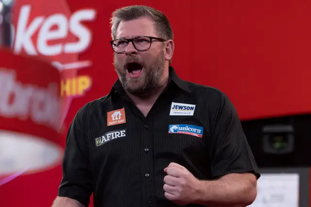 Wade eases through to second round at PDC World Darts Championship with victory over Kuivenhoven