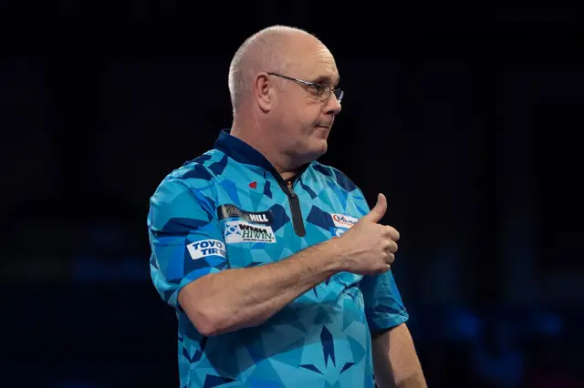 White hits first nine-dart finish of new Players Championship season, loses with 106 average to Suljovic