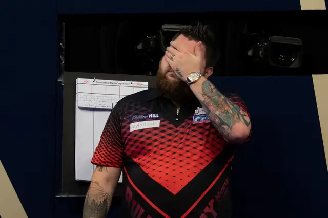VIDEO: Smith fights back tears as Wright lifts PDC World Darts Championship trophy