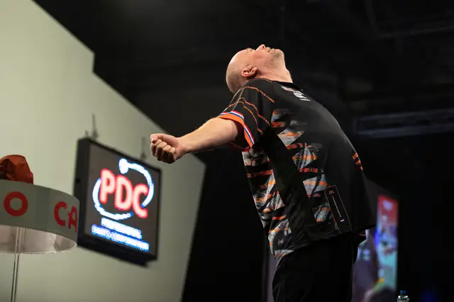Van Barneveld rolls back the years with superb win over defending champion Price, qualifies for Last 16 at Grand Slam of Darts