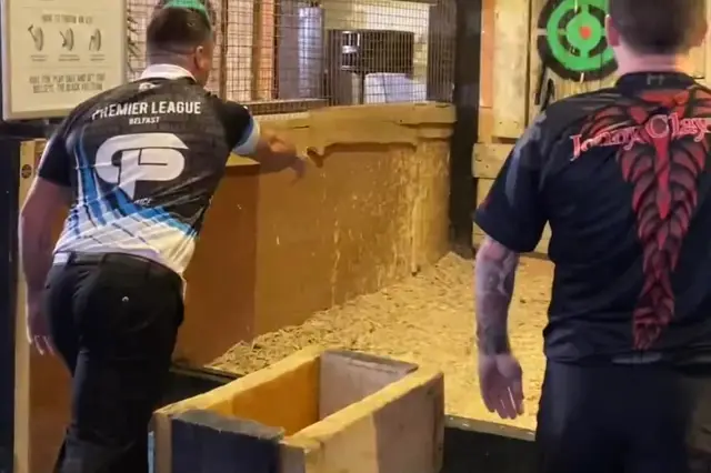 VIDEO: Clayton and Price try their hand at axe-throwing before Premier League Darts in Belfast