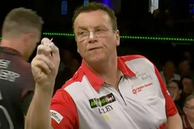 PHOTO: Large section of dartboard covered in chalk by Deller raises debate at World Seniors Darts Championship