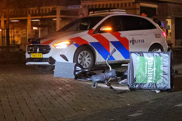 Politieauto botst op maaltijdbezorger op Stationslaan