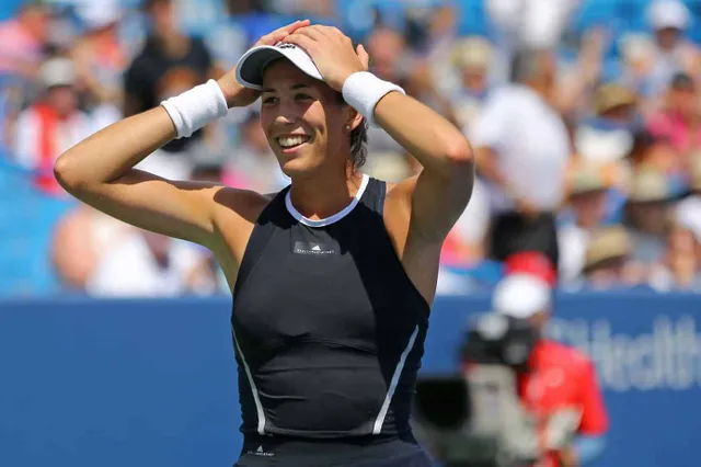 Muguruza says it's a relief to hold champion's trophy again