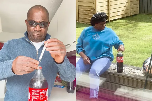 Man maakt cola met Mentos klaar voor zijn vrouw