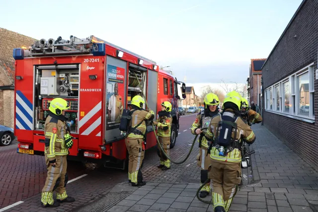 Perscontainer vat vlam in magazijn Aldi Kaatsheuvel