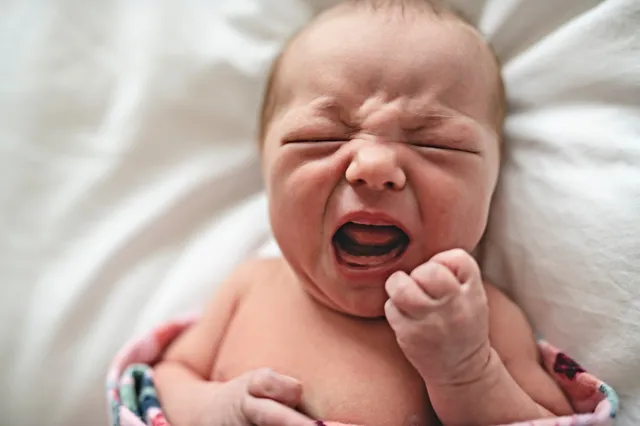 Muziek kan pijn van baby's verminderen tijdens testen of hielprikken