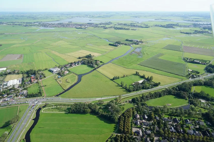 luchtfoto stroomgebied schulpvaart met waterberging draaiweid aerovista