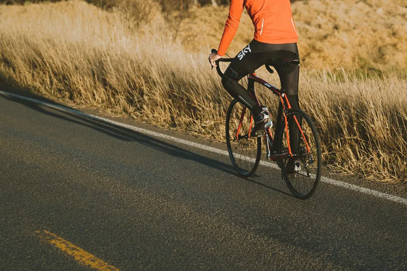 canva photo of person riding road bike