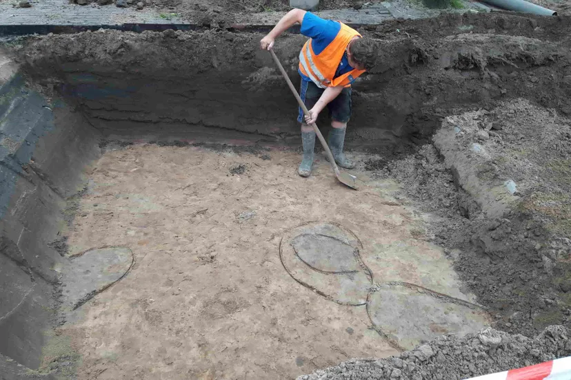 archeoloog aan het werk min