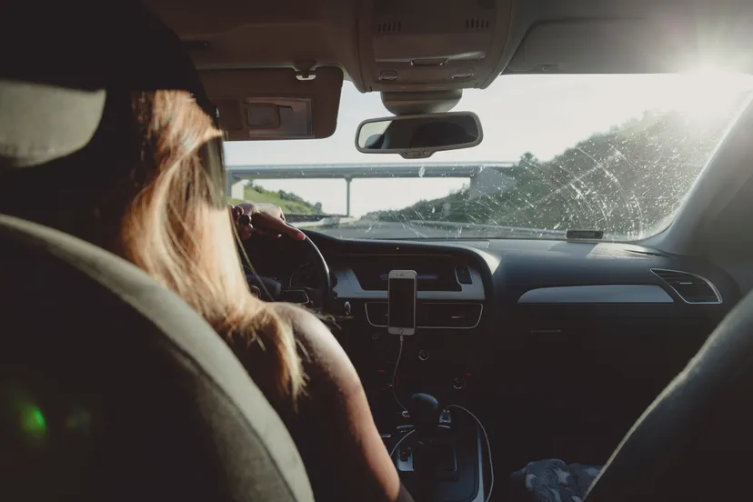 woman driving car on freeway 1386648