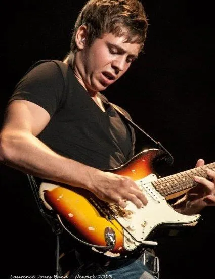 unwsdkb9ufg60rqlfdcjaerrs lawrence jones band