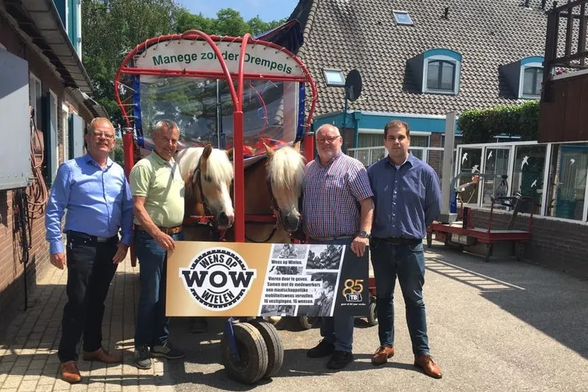 uitreiking wens op wielen cheque