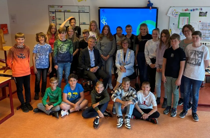 burgemeester bezoekt de inktvis