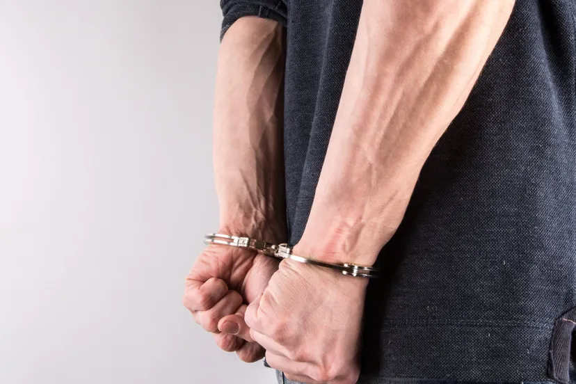 hands in handcuffs 1462608294qt0