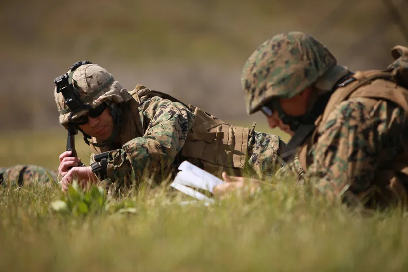 defensegov news photo 110228 m bt412 287 capt christopher robb the forward air controller with 1st tank battalion quick reaction force calls in their position to their higher
